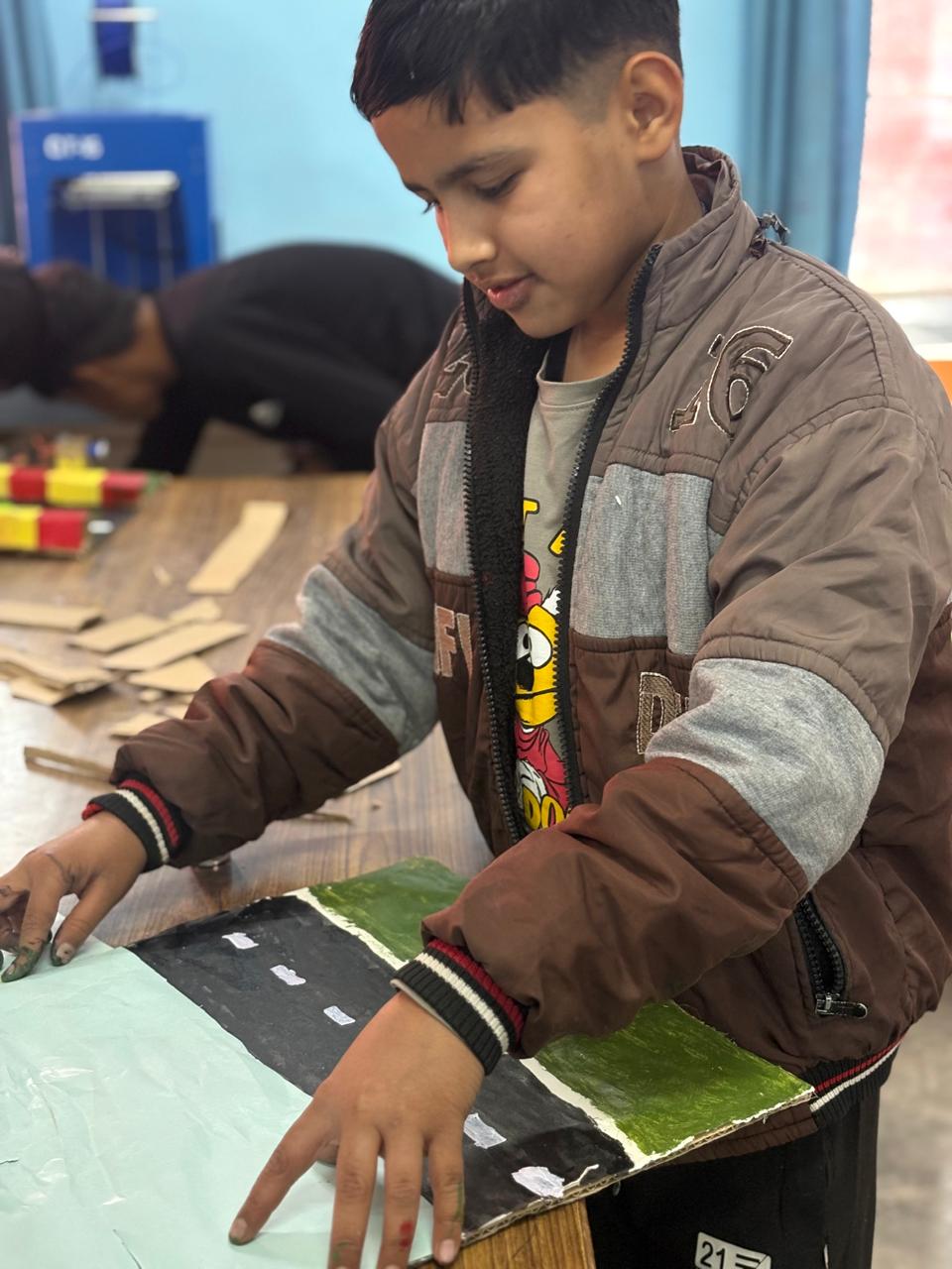 Students at a Relhan Innovation workshop or exhibition