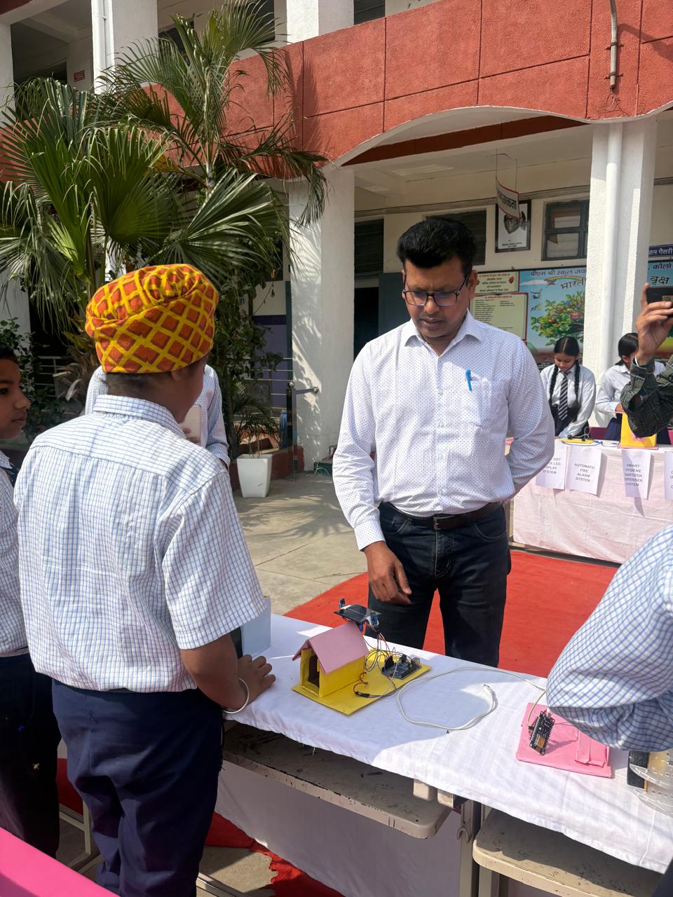 Students at a Relhan Innovation workshop or exhibition